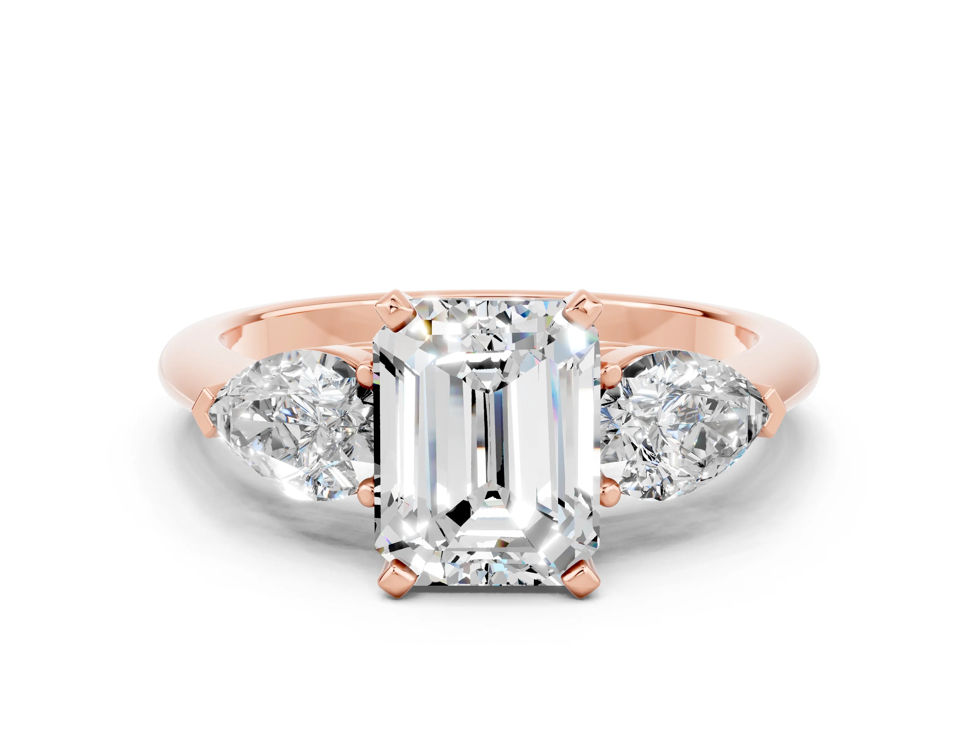 Rose gold Three-Stone Emerald Cut Moissanite Ring with Pear Side Stones and Four-Prong Setting