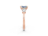 Rose gold Three-Stone Emerald Cut Moissanite Ring with Pear Side Stones and Four-Prong Setting_2