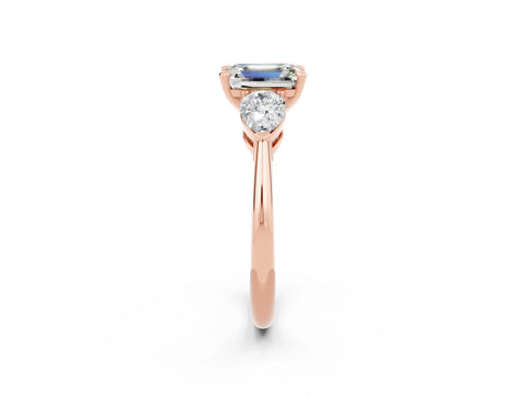 Rose gold Three-Stone Emerald Cut Moissanite Ring with Pear Side Stones and Four-Prong Setting_2