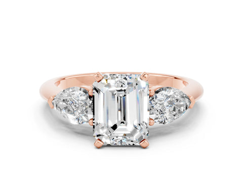 Rose gold Three-Stone Emerald Cut Moissanite Ring with Pear Side Stones and Four-Prong Setting