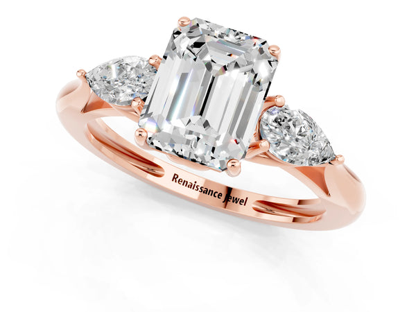 Rose gold Three-Stone Emerald Cut Moissanite Ring with Pear  Side Stones in Four-Prong Setting