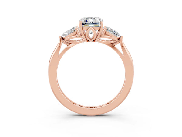 Rose gold Three-Stone Emerald Cut Moissanite Ring with Pear  Side Stones in Four-Prong Setting