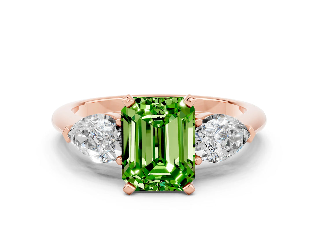 Rose gold Three-Stone Emerald Cut Peridot Ring with Pear Side Stones and Four-Prong Setting