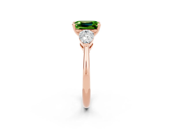 Rose gold Three-Stone Emerald Cut Peridot Ring with Pear Side Stones and Four-Prong Setting