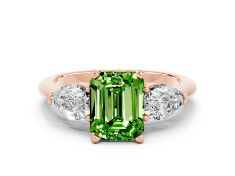 Rose gold Three-Stone Emerald Cut Peridot Ring with Pear Side Stones and Four-Prong Setting