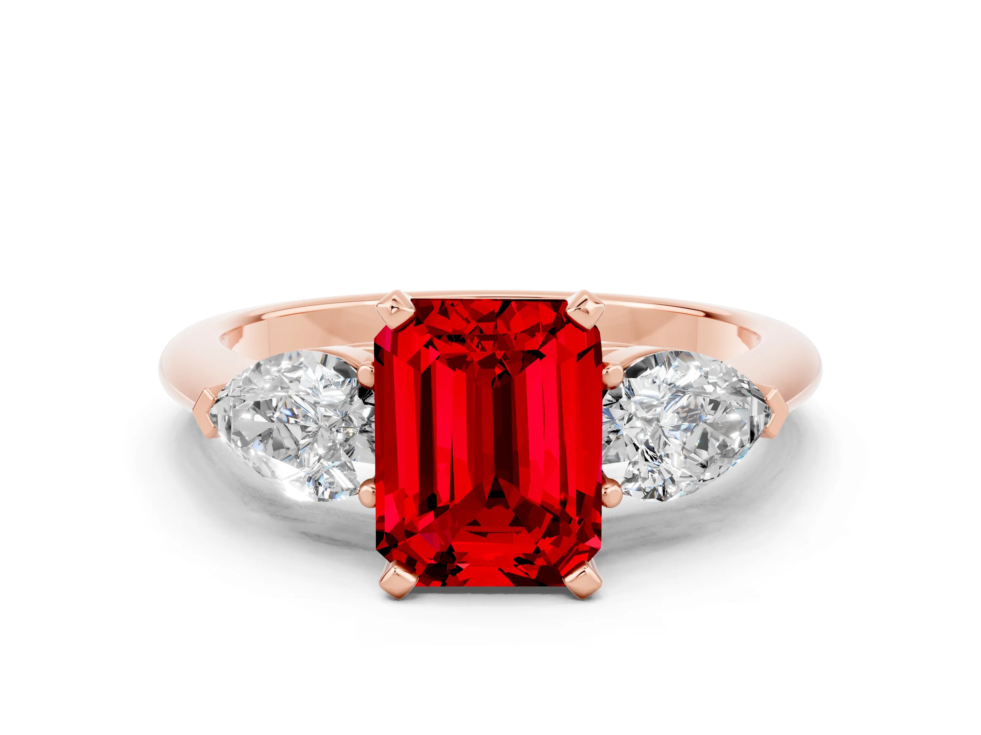 Rose gold Three-Stone Emerald Cut Ruby Ring with Pear Side Stones and Four-Prong Setting