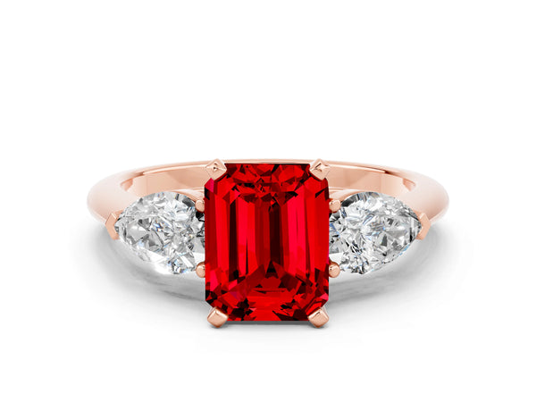 Rose gold Three-Stone Emerald Cut Ruby Ring with Pear Side Stones and Four-Prong Setting