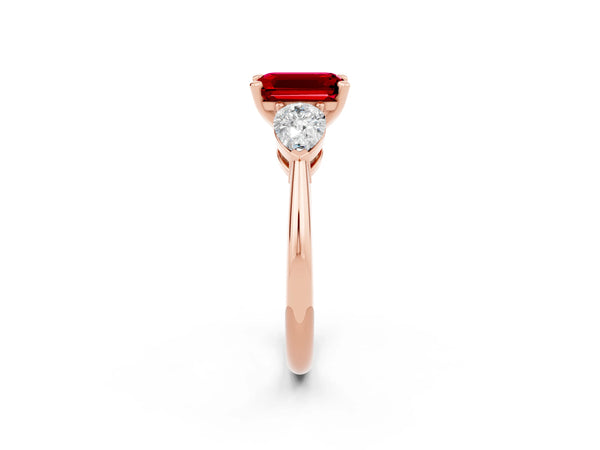 Rose gold Three-Stone Emerald Cut Ruby Ring with Pear Side Stones and Four-Prong Setting