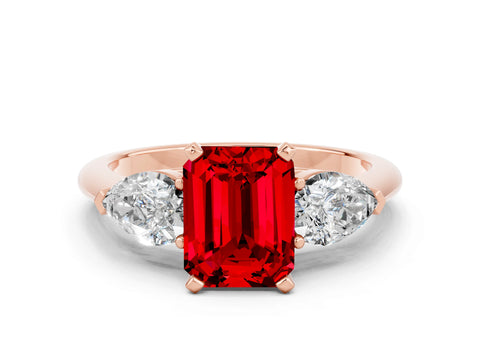 Rose gold Three-Stone Emerald Cut Ruby Ring with Pear Side Stones and Four-Prong Setting