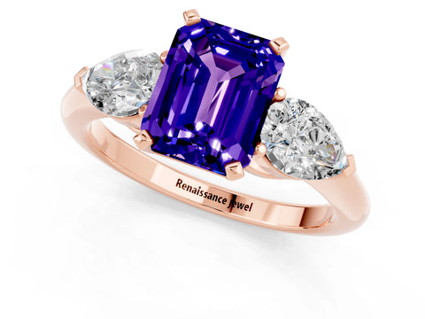 Rose gold Three-Stone Emerald Cut Tanzanite Ring with Pear Side Stones and Four-Prong Setting_1