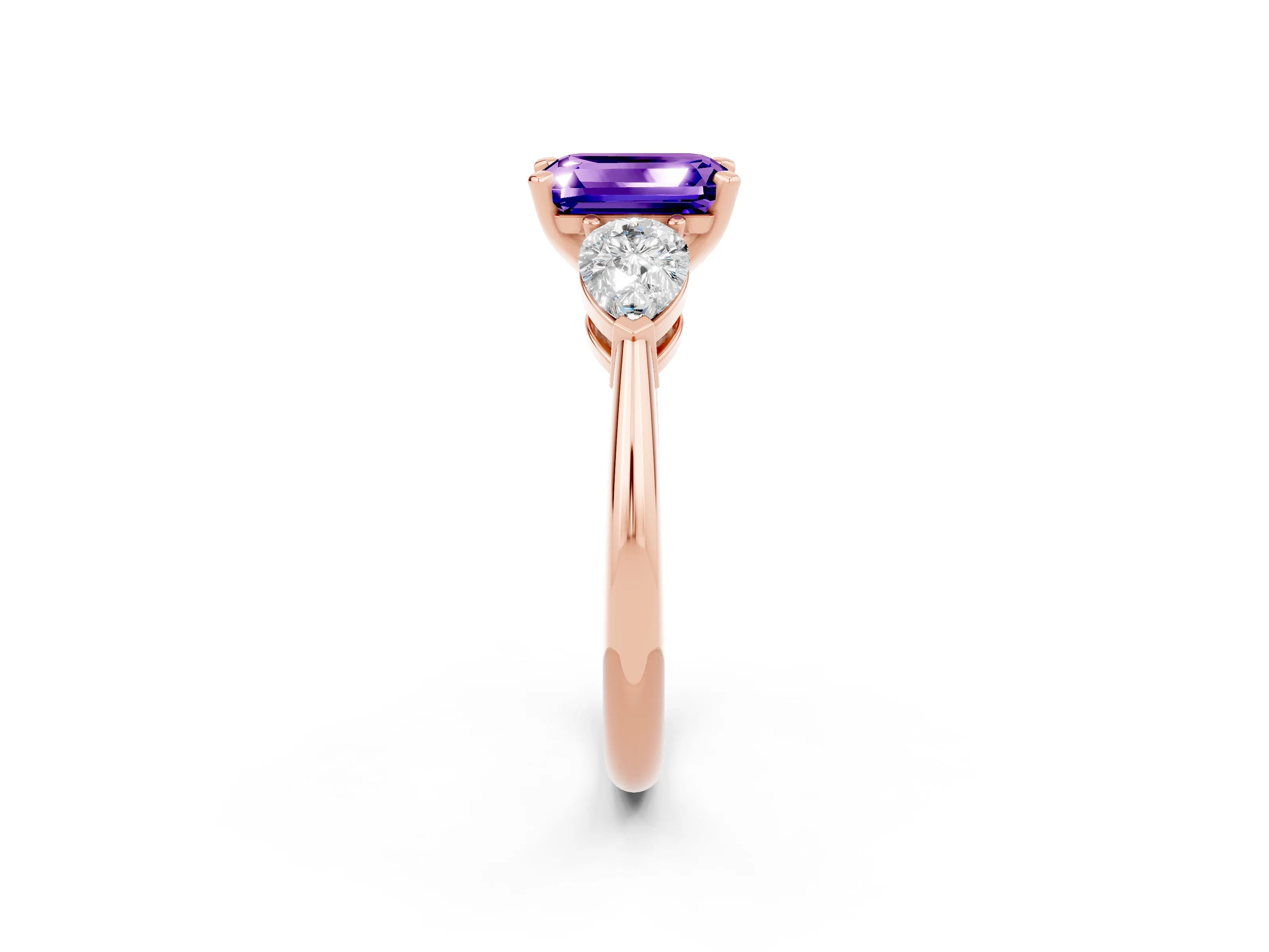 Rose gold Three-Stone Emerald Cut Tanzanite Ring with Pear Side Stones and Four-Prong Setting_2