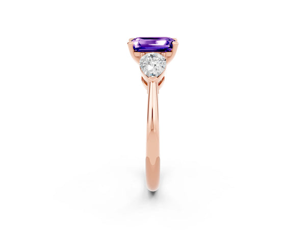 Rose gold Three-Stone Emerald Cut Tanzanite Ring with Pear Side Stones and Four-Prong Setting