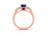 Rose gold Three-Stone Emerald Cut Tanzanite Ring with Pear Side Stones and Four-Prong Setting_3