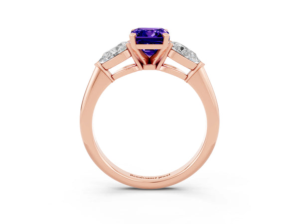 Rose gold Three-Stone Emerald Cut Tanzanite Ring with Pear Side Stones and Four-Prong Setting
