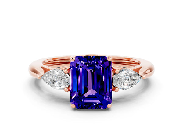 Rose gold Three-Stone Emerald Cut Tanzanite Ring with Pear  Side Stones in Four-Prong Setting