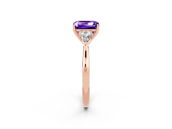 Rose gold Three-Stone Emerald Cut Tanzanite Ring with Pear  Side Stones in Four-Prong Setting