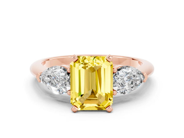 Rose gold Three-Stone Emerald Cut Yellow Sapphire Ring with Pear Side Stones and Four-Prong Setting