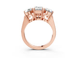 Rose gold Three-Stone Emerald Diamond Engagement Ring with Prong Setting on a Classic Band_6