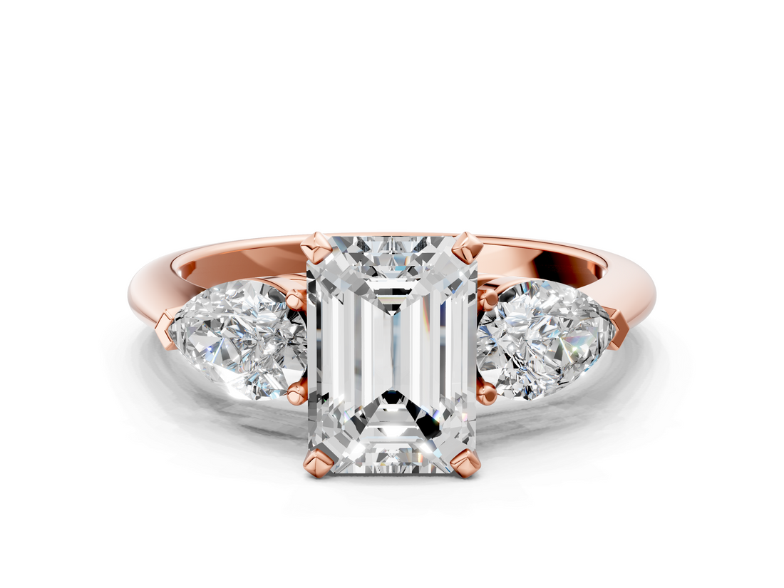 Rose gold Three-Stone Emerald Diamond Ring with Pear Side Stones in Four-Prong Setting_89