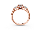 Rose gold Three-Stone Emerald Diamond Ring with Pear Side Stones in Four-Prong Setting_92