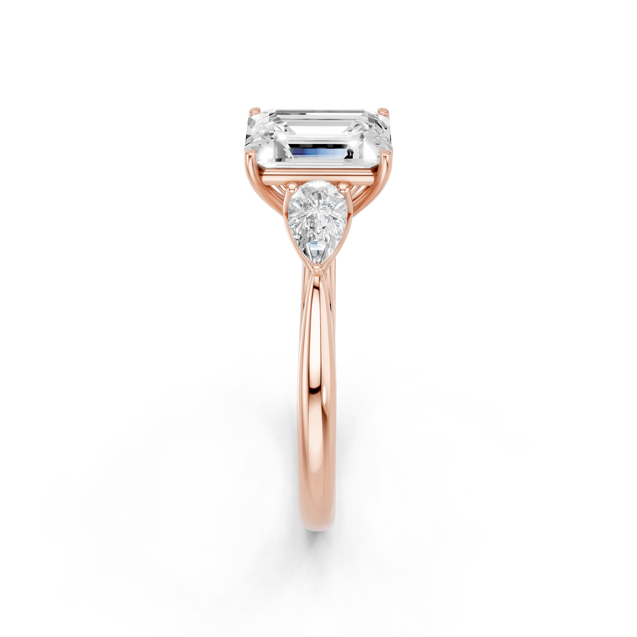 Rose gold Three-Stone Emerald Diamond Solitaire Ring with Pear Side Stones and Four-Prong Setting_4