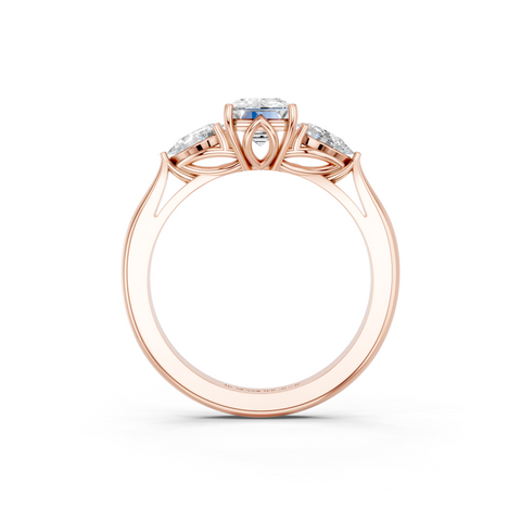 Rose gold Three-Stone Emerald Diamond Solitaire Ring with Pear Side Stones and Four-Prong Setting_5