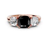 Rose gold Three-Stone Fancy Black Cushion Cut Cut Diamond Ring with Channel Set Band and Four-Prong Setting