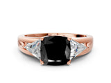 Rose gold Three-Stone Fancy Black Cushion Cut Cut Diamond Ring with Trillion Side Stones on a Split Shank Band