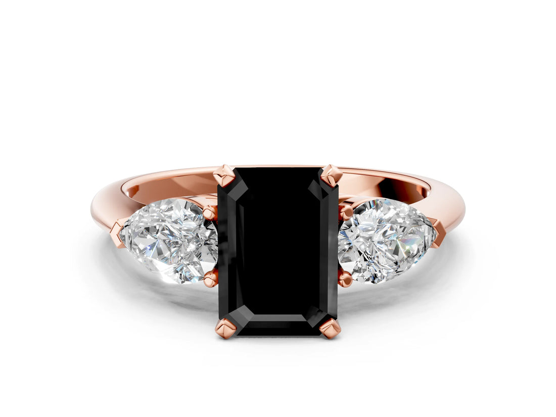 Rose gold Three-Stone Fancy Black Emerald Cut Diamond Ring with Pear Side Stones and Four-Prong Setting