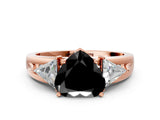 Rose gold Three-Stone Fancy Black Heart Cut Cut Diamond Ring with Trillion Side Stones on a Split Shank Band