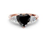 Rose gold Three-Stone Fancy Black Heart Cut Diamond Ring with Pear Side Stones and Four-Prong Setting