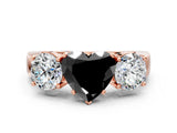 Rose gold Three-Stone Fancy Black Heart Cut Diamond Ring with Round Side Stones, Classic Band, and Four-Prong Setting