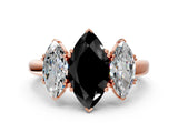 Rose gold Three-Stone Fancy Black Marquise Cut Cut Diamond Ring with Channel Set Band and Four-Prong Setting