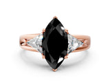 Rose gold Three-Stone Fancy Black Marquise Cut Cut Diamond Ring with Trillion Side Stones on a Split Shank Band