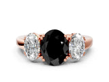 Rose gold Three-Stone Fancy Black Oval Cut Cut Diamond Ring with Channel Set Band and Four-Prong Setting