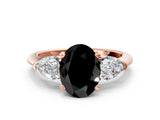 Rose gold Three-Stone Fancy Black Oval Cut Diamond Ring with Pear Side Stones and Four-Prong Setting