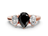 Rose gold Three-Stone Fancy Black Pear Cut Cut Diamond Ring with Channel Set Band and Four-Prong Setting