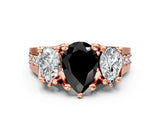 Rose gold Three-Stone Fancy Black Pear Cut Cut Diamond Ring with Channel-Set Band and Four-Prong Setting_12