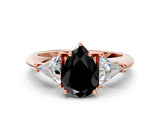 Rose gold Three-Stone Fancy Black Pear Cut Cut Diamond Ring with Trillion Side Stones and Four-Prong Setting_3