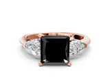 Rose gold Three-Stone Fancy Black Princess Cut Diamond Ring with Pear Side Stones and Four-Prong Setting