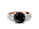 Rose gold Three-Stone Fancy Black Round Cut Diamond Ring with Pear Side Stones and Four-Prong Setting