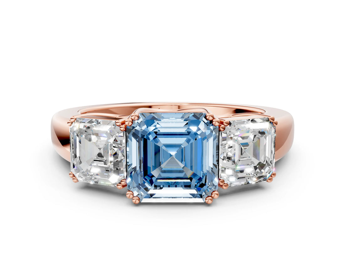 Rose gold Three-Stone Fancy Blue Asscher Cut Cut Diamond Ring with Channel Set Band and Four-Prong Setting