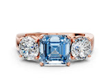 Rose gold Three-Stone Fancy Blue Asscher Cut Diamond Ring with Round Side Stones, Classic Band, and Four-Prong Setting_12