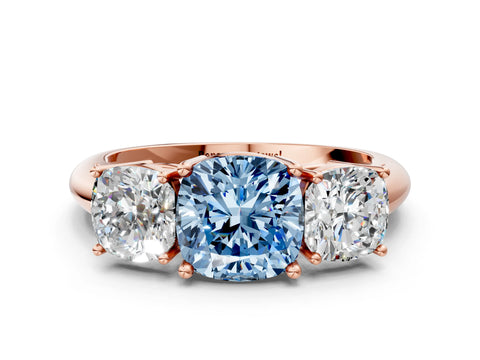 Rose gold Three-Stone Fancy Blue Cushion Cut Cut Diamond Engagement Ring with Prong Setting on a White Gold Band