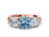 Rose gold Three-Stone Fancy Blue Cushion Cut Cut Diamond Ring with Channel-Set Band and Prong Setting