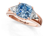 Rose gold Three-Stone Fancy Blue Cushion Cut Cut Diamond Ring with Trillion Side Stones on a Split Shank Band_1