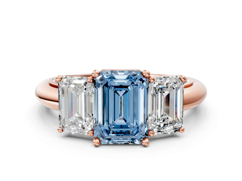 Rose gold Three-Stone Fancy Blue Emerald Cut Cut Diamond Engagement Ring with Prong Setting on a White Gold Band