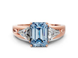 Rose gold Three-Stone Fancy Blue Emerald Cut Cut Diamond Ring with Trillion Side Stones on a Split Shank Band_6