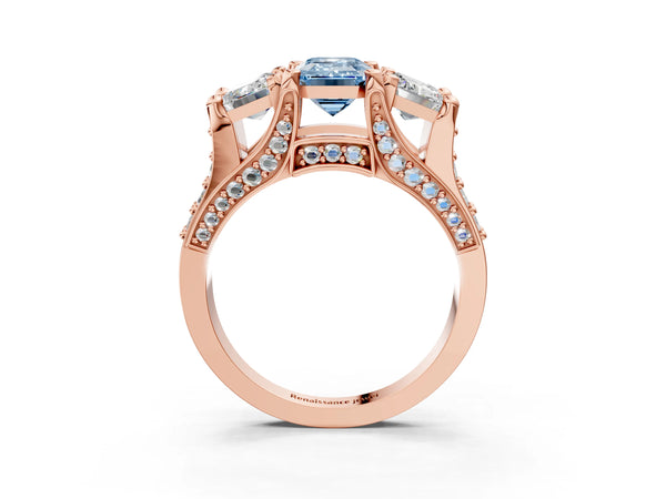 Rose gold Fancy Blue Emerald Cut Diamond Three-Stone Ring with Channel Set Band and Four-Prong Setting