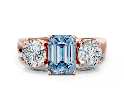 Rose gold Three-Stone Fancy Blue Emerald Cut Diamond Ring with Round Side Stones, Classic Band, and Four-Prong Setting
